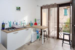 Kuchyň nebo kuchyňský kout v ubytování Guest House Rione Cappuccini