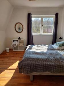 Postel nebo postele na pokoji v ubytování Kongsø Bed & Breakfast + 28 fotografií