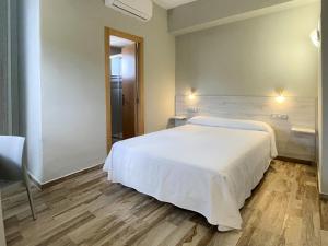 Postel nebo postele na pokoji v ubytování Te Maná Hotel
