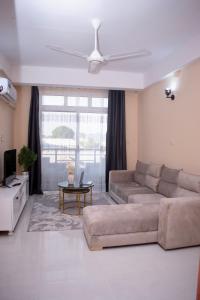 Χώρος καθιστικού στο Sacha Apartments +17 φωτογραφίες