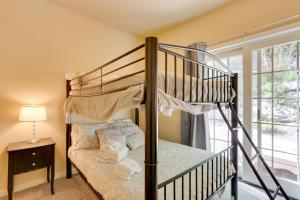 a bedroom with a bunk bed and a staircase at Half-Mi to Big Boulder Lake Townhome with Deck! in Lake Harmony