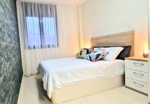 Postel nebo postele na pokoji v ubytování Apartament La Rapita
