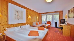Postel nebo postele na pokoji v ubytování Hotel Schwarzenbergs Traube