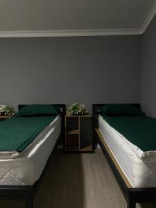 Voodi või voodid majutusasutuse Zam Zam Hostel toas
