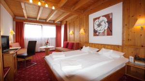 Giường trong phòng chung tại Hotel Schwarzenbergs Traube