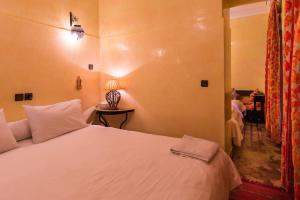 Cama o camas de una habitación en Riad Omar