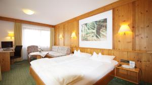 Postel nebo postele na pokoji v ubytování Hotel Schwarzenbergs Traube