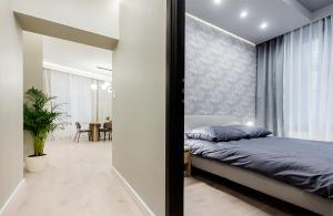 En eller flere senge i et værelse på Luxury Apartment Kościuszki 9 - Apartament Vellore