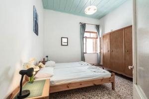 Ένα ή περισσότερα κρεβάτια σε δωμάτιο στο Holiday home frydaki sea view