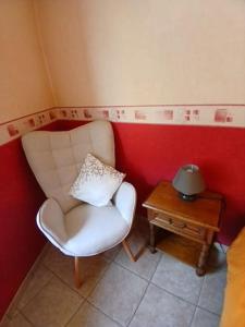 Część wypoczynkowa w obiekcie Gîte du Pressoir