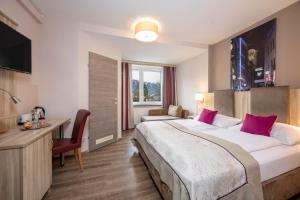 Posteľ alebo postele v izbe v ubytovaní HOTEL junior by MAX 70 + 35 fotografií