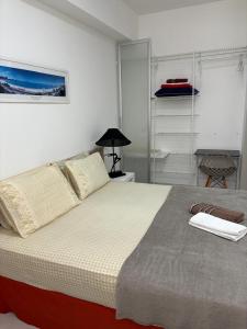 Ένα ή περισσότερα κρεβάτια σε δωμάτιο στο Flat 1Q Praia de Copacabana - Apto 202 +25 φωτογραφίες