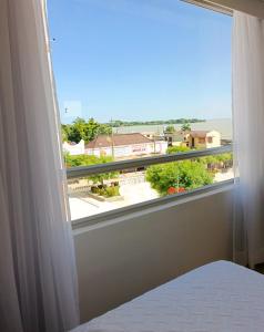 Postel nebo postele na pokoji v ubytování Hotel Ayapel Paraiso