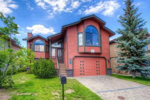 a large red house with a red garage at Epiphany home in South Lake Tahoe