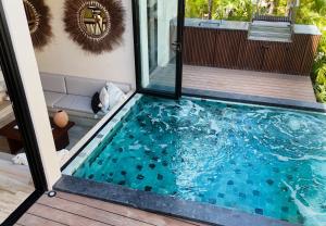 Bazén v ubytování Trobbu Boutique Collection Tulum nebo v jeho okolí