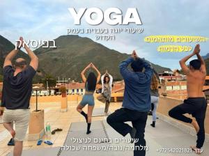 a group of people doing yoga on a rooftop at jtjy in San Antonio