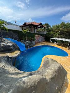 La alberca dentro o cerca de VILLA ORION piscina y discoteca PRIVADA K18