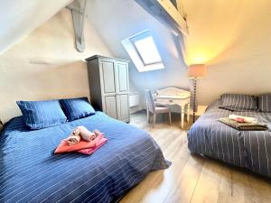 Ένα ή περισσότερα κρεβάτια σε δωμάτιο στο Ty Chouette Cottage, proche Lac, Nature +27 φωτογραφίες