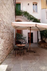 Patio alebo iná vonkajšia časť ubytovania Hotel Borgovico