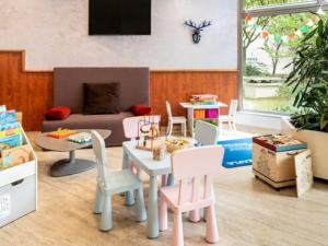 Χώρος καθιστικού στο Adagio Paris Parc Expo Appart hotel +5 φωτογραφίες