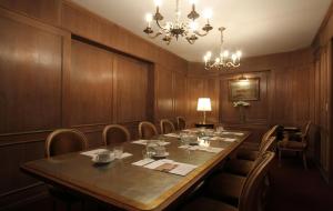 a conference room with a long table and chairs at Carsson Hotel Downtown Buenos Aires in Buenos Aires