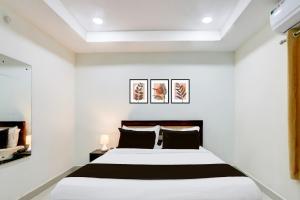 Super Collection O Madhapur Near Cyber Tower客房内的一张或多张床位