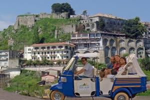 a group of people riding in a golf cart at Hotel Residence Due Mari in Marcellinara