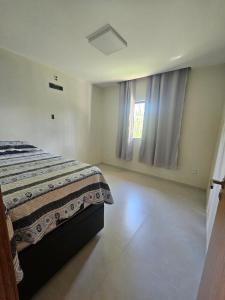 Postel nebo postele na pokoji v ubytování Casa recanto da mata sta tereza 8km do centro