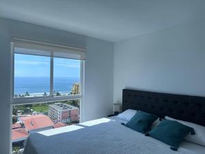 Ένα ή περισσότερα κρεβάτια σε δωμάτιο στο 16th Floor Oceanview Bliss +51 φωτογραφίες