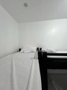 Postel nebo postele na pokoji v ubytování AA Hostel