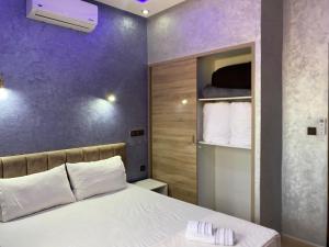 Postel nebo postele na pokoji v ubytování IGHIZ INN resort
