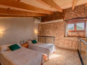 Postel nebo postele na pokoji v ubytování Son Garbi in Algaida with Private Pool + 22 fotografií