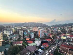 an overhead view of a city with buildings at Liam and Linus Condo 1 Studio Type in Baguio +9 photos