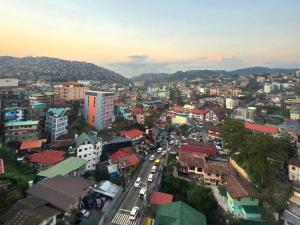 an aerial view of a city with buildings at Liam and Linus Condo 1 Studio Type in Baguio