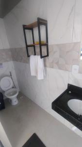 Ένα μπάνιο στο Casa Próx a praia com diversão para familia