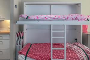 Postel nebo postele na pokoji v ubytování Asterie E 0302