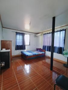 Postel nebo postele na pokoji v ubytování Russville Apartment