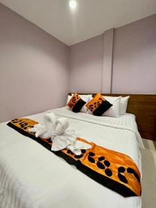 Postel nebo postele na pokoji v ubytování Sampheng Apartment + 30 fotografií