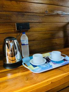 Příslušenství pro přípravu čaje a kávy v ubytování Sigiri Lodge Tree House + 27 fotografií