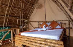 Postel nebo postele na pokoji v ubytování Wonderland Beach Resort + 34 fotografií