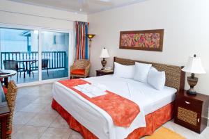 Кровать или кровати в номере Rostrevor Hotel