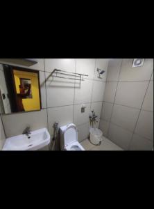 Koupelna v ubytování Hotel Adya Classsic