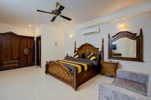 Postel nebo postele na pokoji v ubytování Amrit Hotel - Hotel & Banquet,Sector 32 + 48 fotografií