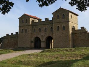 a large brick building on a grassy hill at South Shore Guest House in South Shields