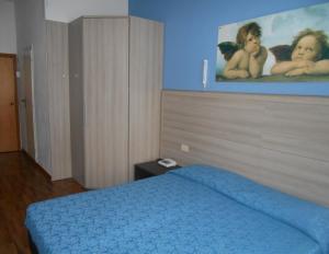 Postel nebo postele na pokoji v ubytování Hotel Lory My Wellness SPA