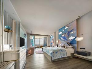 Postel nebo postele na pokoji v ubytování Qinhuangdao Marriott Resort