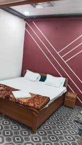 Una cama o camas en una habitación de S K B home stay