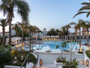 The swimming pool at or close to Caramel, A Grecotel Resort to Live