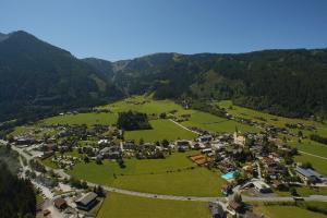 an aerial view of a village in the mountains at Ferienwohnung Trattenhaus in Krimml