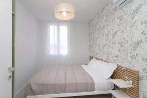 Letto o letti in una camera di Benedetta suite in florence